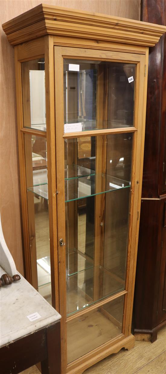 A slender pine display cabinet W.65cm